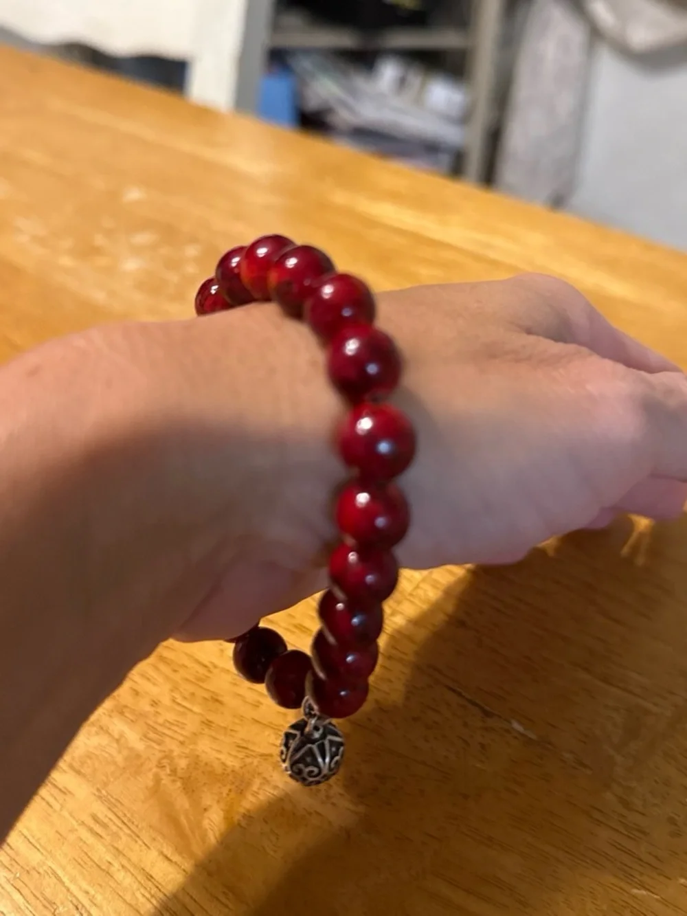 Hand Crafted Red Beaded Bracelet with Silver Filigree Charm